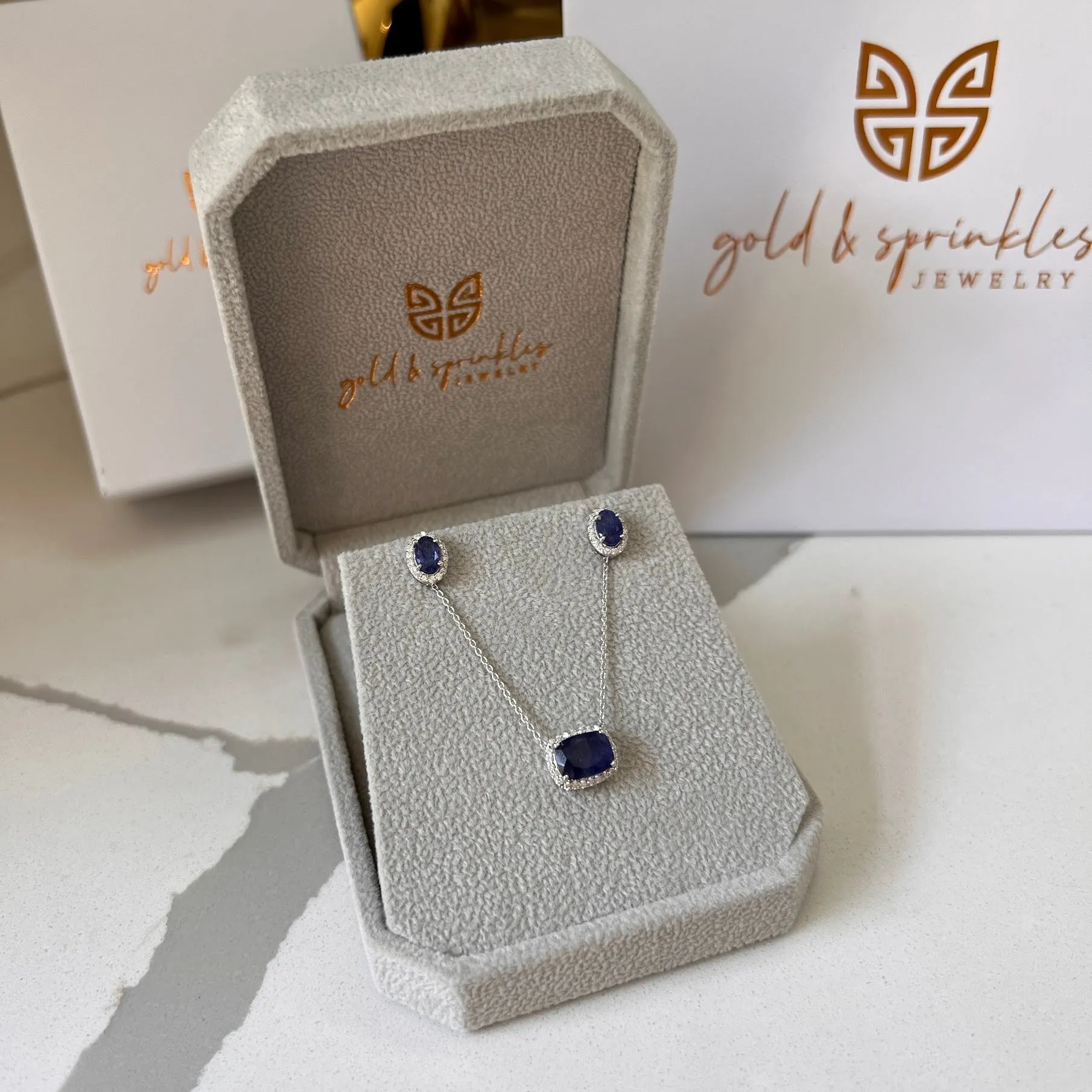 Blue Sapphire Solitaire with Diamond Halo Necklace