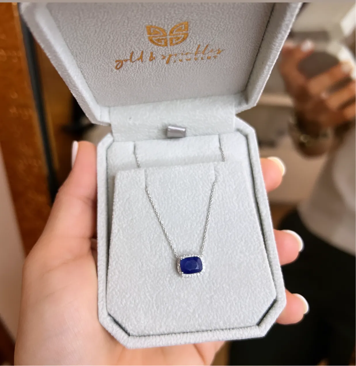 Blue Sapphire Solitaire with Diamond Halo Necklace