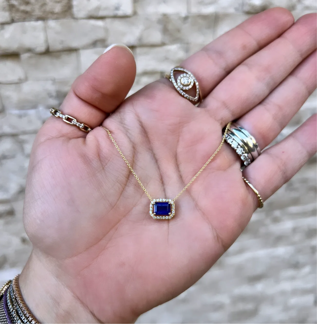 Blue Sapphire Solitaire with Diamond Halo Necklace